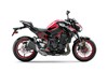 Profile angle of a motorcycle staged in a white studio background.