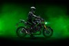 Profile angle of a person on a motorcycle. 