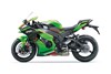 Profile angle of a motorcycle staged in a white studio background.