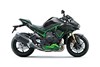 Profile angle of a motorcycle staged in a white studio background.