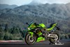 Side angle of a motorcycle staged on a racetrack.