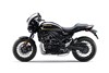 Side angle of a motorcycle staged in a white studio background.