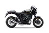 Profile angle of a motorcycle staged in a white studio background.