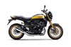 Profile angle of a motorcycle staged in a white studio background.