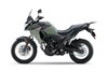 Side angle of a motorcycle staged in a white studio background.