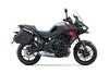 Profile angle of a motorcycle staged in a white studio background.