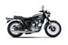 Profile angle of a motorcycle staged in a white studio background.