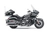 Profile angle of a motorcycle staged in a white studio background.
