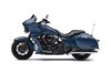 Side angle of a motorcycle staged in a white studio background.