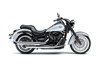 Profile angle of a motorcycle staged in a white studio background.