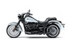 Side angle of a motorcycle staged in a white studio background.