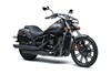 Three-quarter front angle of a motorcycle staged in a white studio background.