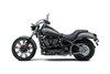 Side angle of a motorcycle staged in a white studio background.