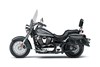Side angle of a motorcycle staged in a white studio background.