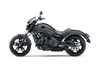 Side angle of a motorcycle staged in a white studio background.