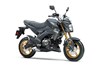 Three-quarter front angle of a motorcycle staged in a white studio background.