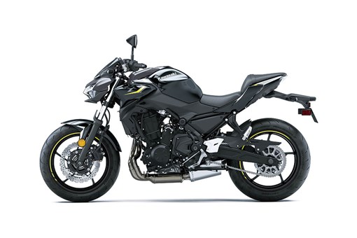 Side angle of a black motorcycle staged in a white studio background. opens in a new window