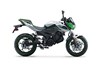 Side angle of a motorcycle staged in a white studio background.