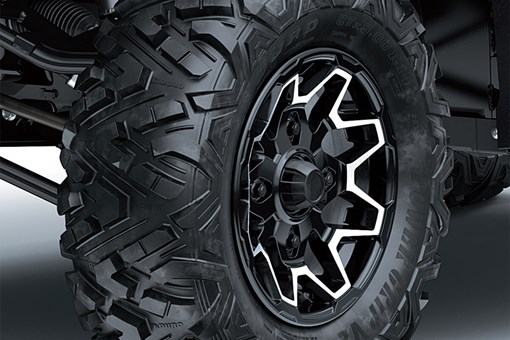 Closeup, three-quarter front angle of a side x side's wheel. opens in a new window