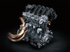 Front angle of a side x side's engine staged in a black studio background.