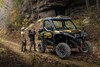 Three-quarter front angle of a side x side parked off-road.