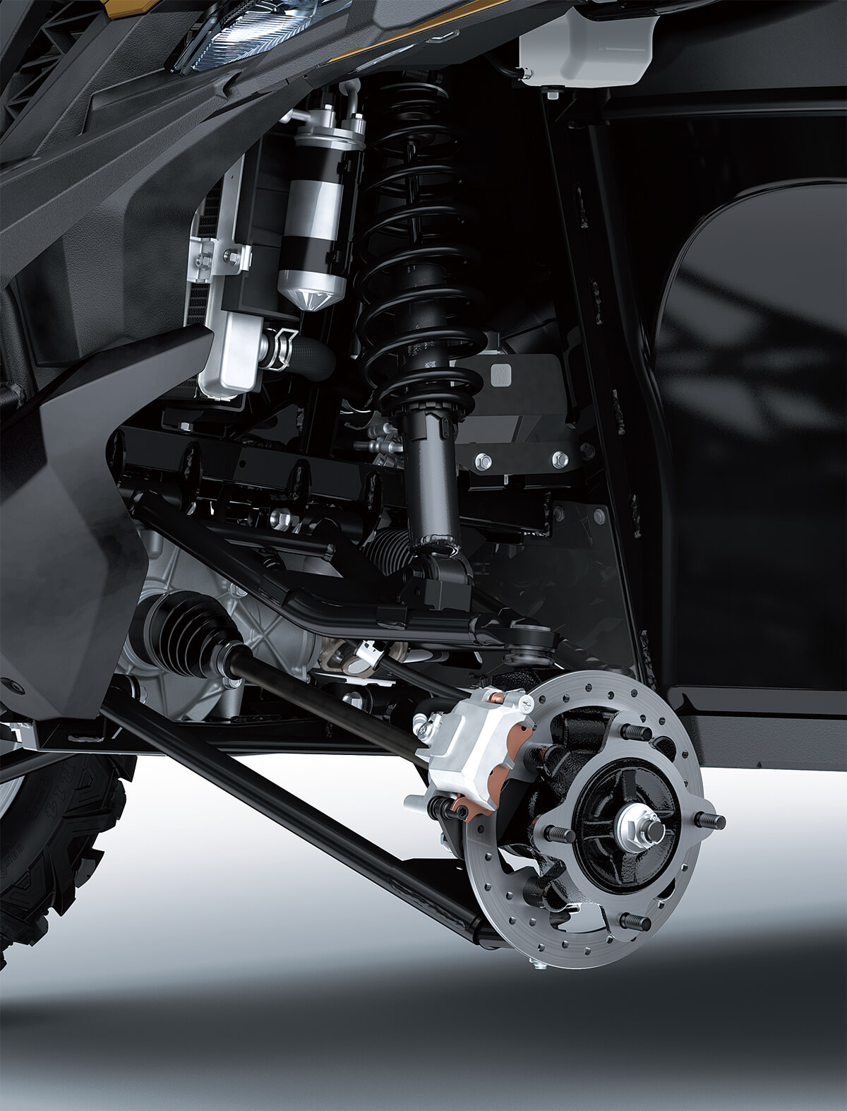 Closeup, three-quarter front angle of a side x side's suspension system.