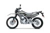Profile angle of a motorcycle staged in a white studio background.