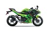 Profile angle of a motorcycle staged in a white studio background.