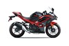 Profile angle of a motorcycle staged in a white studio background.
