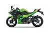 Side angle of a motorcycle staged in a white studio background.