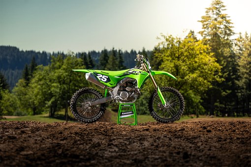 Profile angle of a motorcycle staged on dirt. opens in a new window