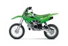 Side angle of a green motorcycle staged in a white studio background.