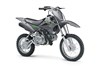 Three-quarter front angle of a gray motorcycle staged in a white studio background.