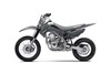 Side angle of a gray motorcycle staged in a white studio background.