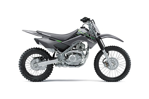 Profile angle of a gray motorcycle staged in a white studio background. opens in a new window