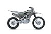  Side angle of a grey motorcycle staged in a white studio background.