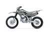  Side angle of a grey motorcycle staged in a white studio background.