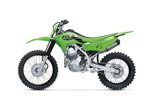  Profile angle of a green motorcycle staged in a white studio background. opens in a new window