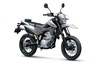 Three-quarter front angle of a gray motorcycle staged in a white studio background.