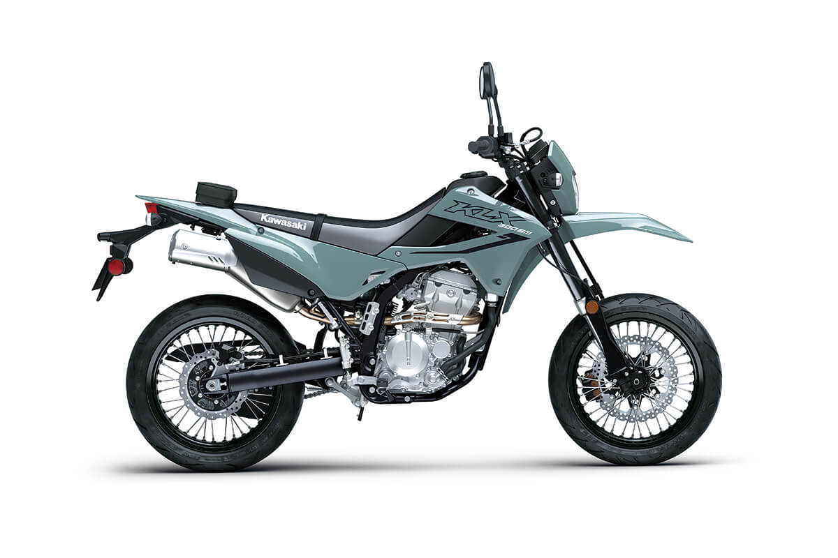 Profile angle of a motorcycle staged in a white studio background.