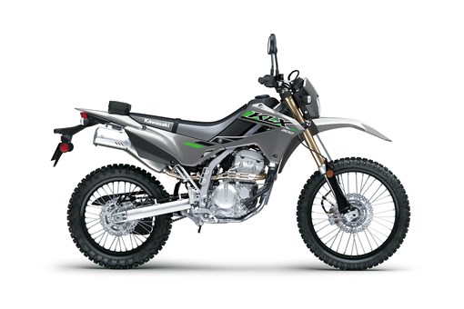 Profile angle of a gray motorcycle staged in a white studio background. opens in a new window