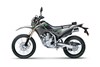 Side angle of a gray motorcycle staged in a white studio background.