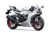 Three-quarter front angle of a motorcycle staged in a white studio background.