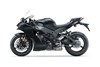 Side angle of a motorcycle staged in a white studio background.