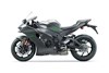 Side angle of a motorcycle staged in a white studio background.