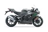 Profile angle of a motorcycle staged in a white studio background.