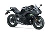 Three-quarter front angle of a motorcycle staged in a white studio background.