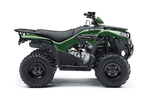Profile angle of a green ATV staged in a white studio background. opens in a new window