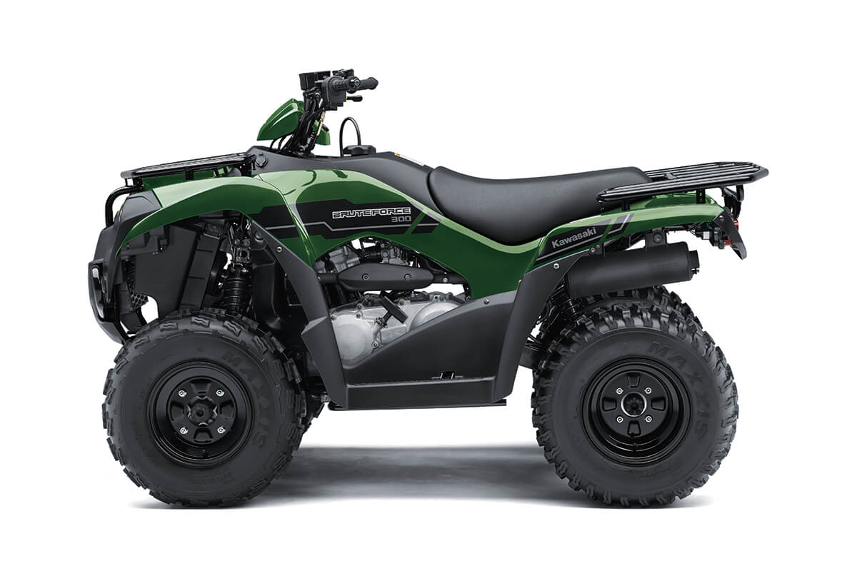Side angle of a green ATV staged in a white studio background.