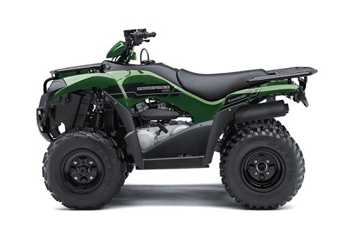 Side angle of a green ATV staged in a white studio background. opens in a new window